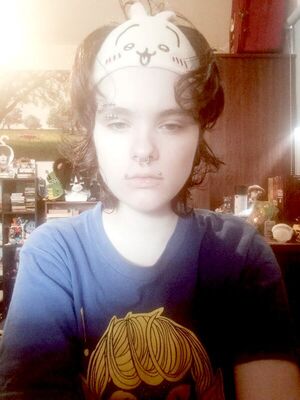 The Usagi sleeping mask is folded and pushing my hair out of my face. I look sufficiently gross.