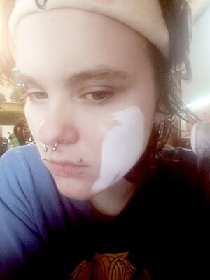 White makeup on my cheek.